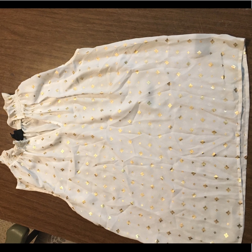 White sleeveless blouse!